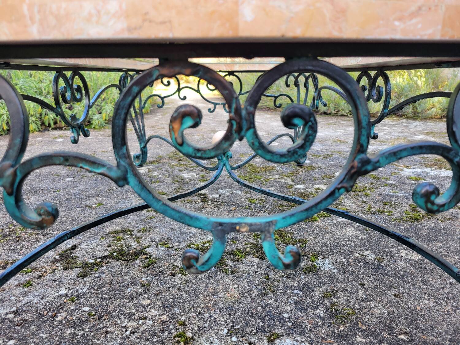 Pink marble and wrought iron coffee table