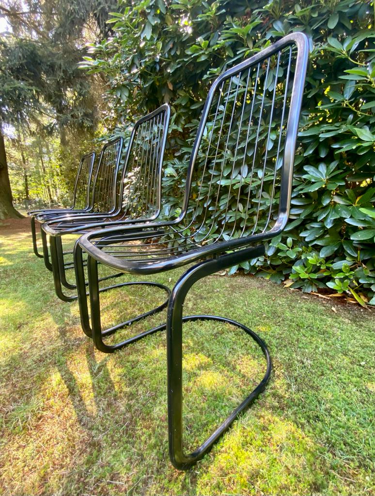 Set of four black highback dining chairs,  1970s