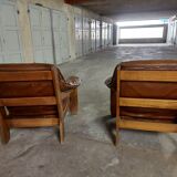 Armchairs in leather and vintage wood 70's