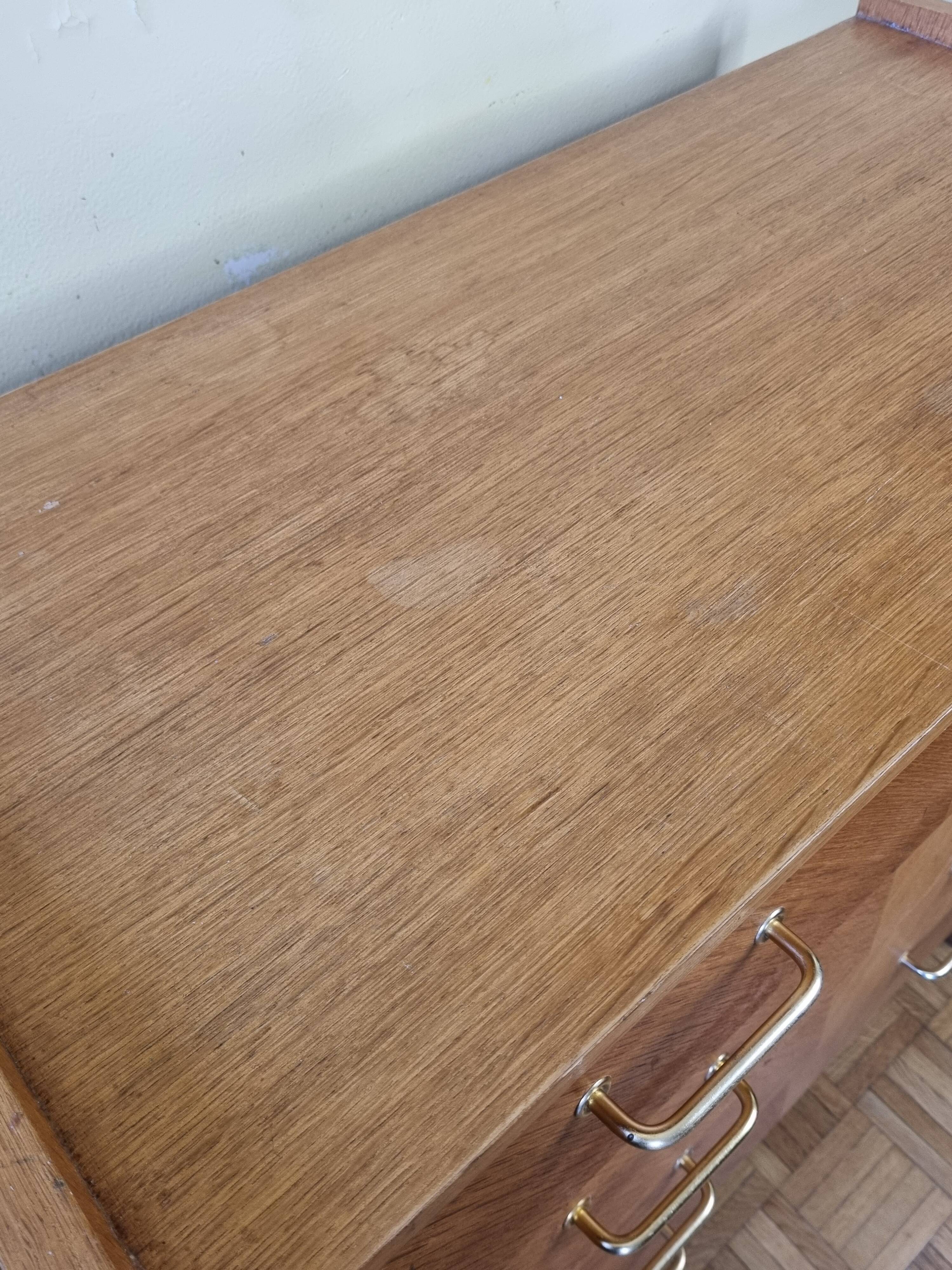 Vintage chest of drawers in modernist veneered wood from the 50s