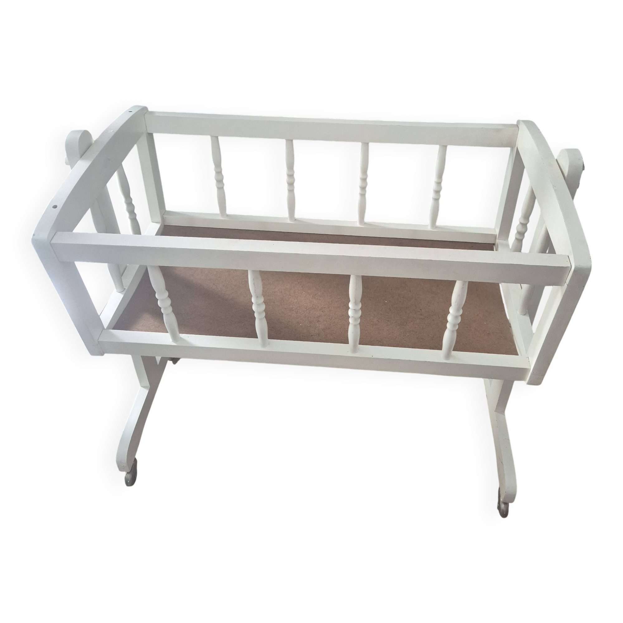 white wooden rocking cradle for baby or doll