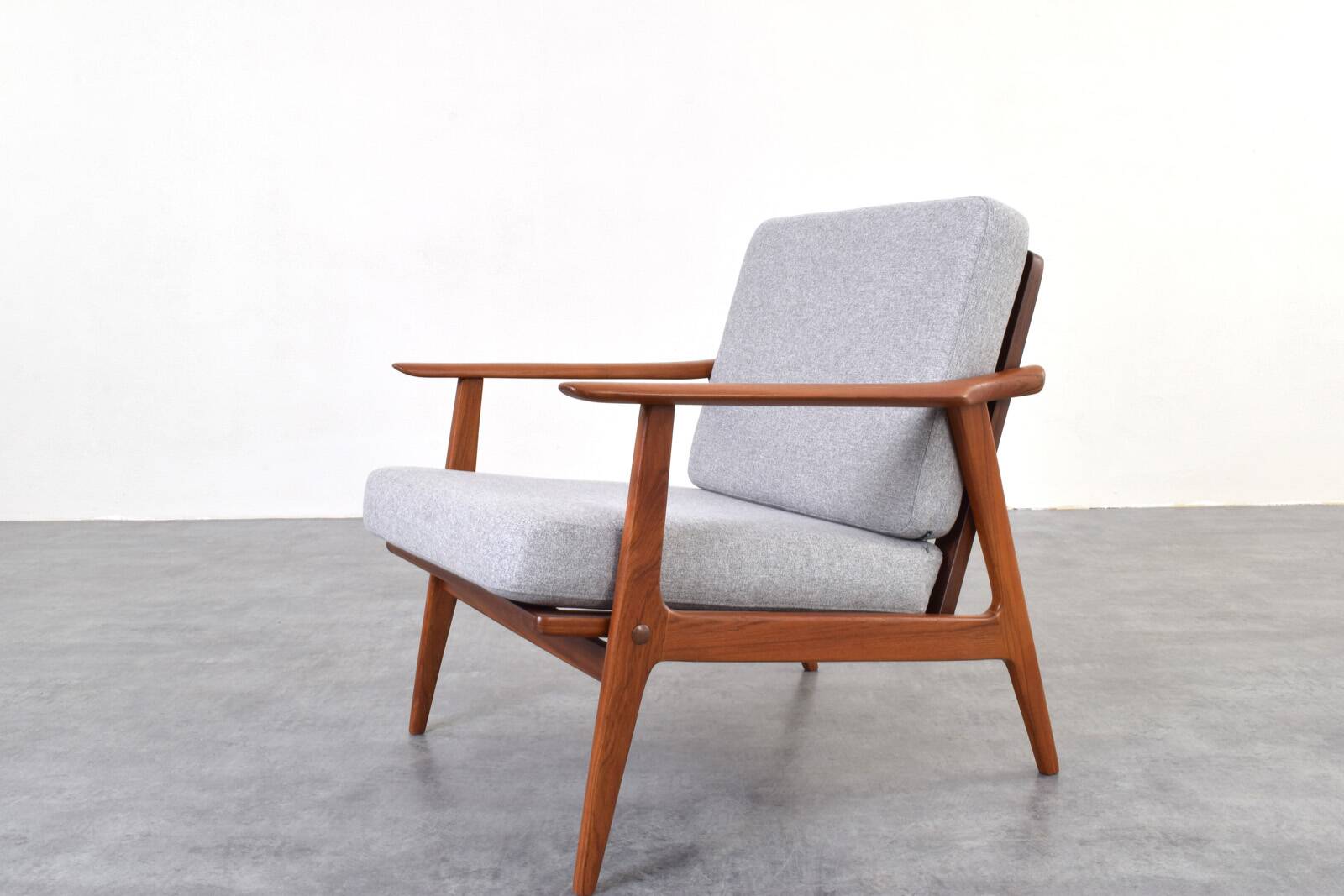 Fauteuil en teck danois des années 1960.