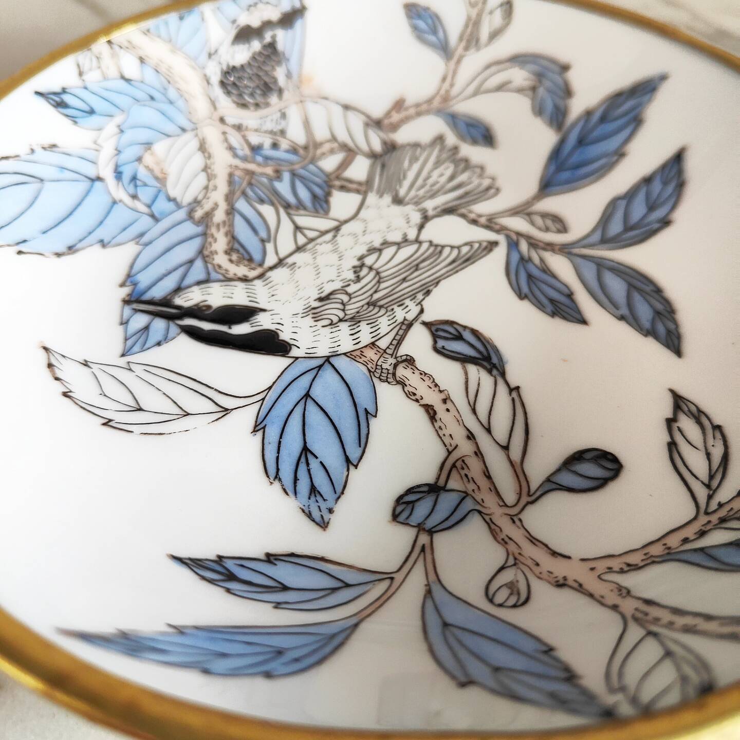 Porcelain and brass bowl