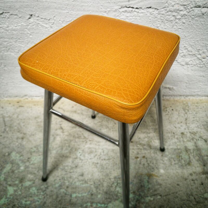 Vintage stool sitting skaï