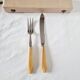 Case with cutlery for serving or cutting meat in baquelite