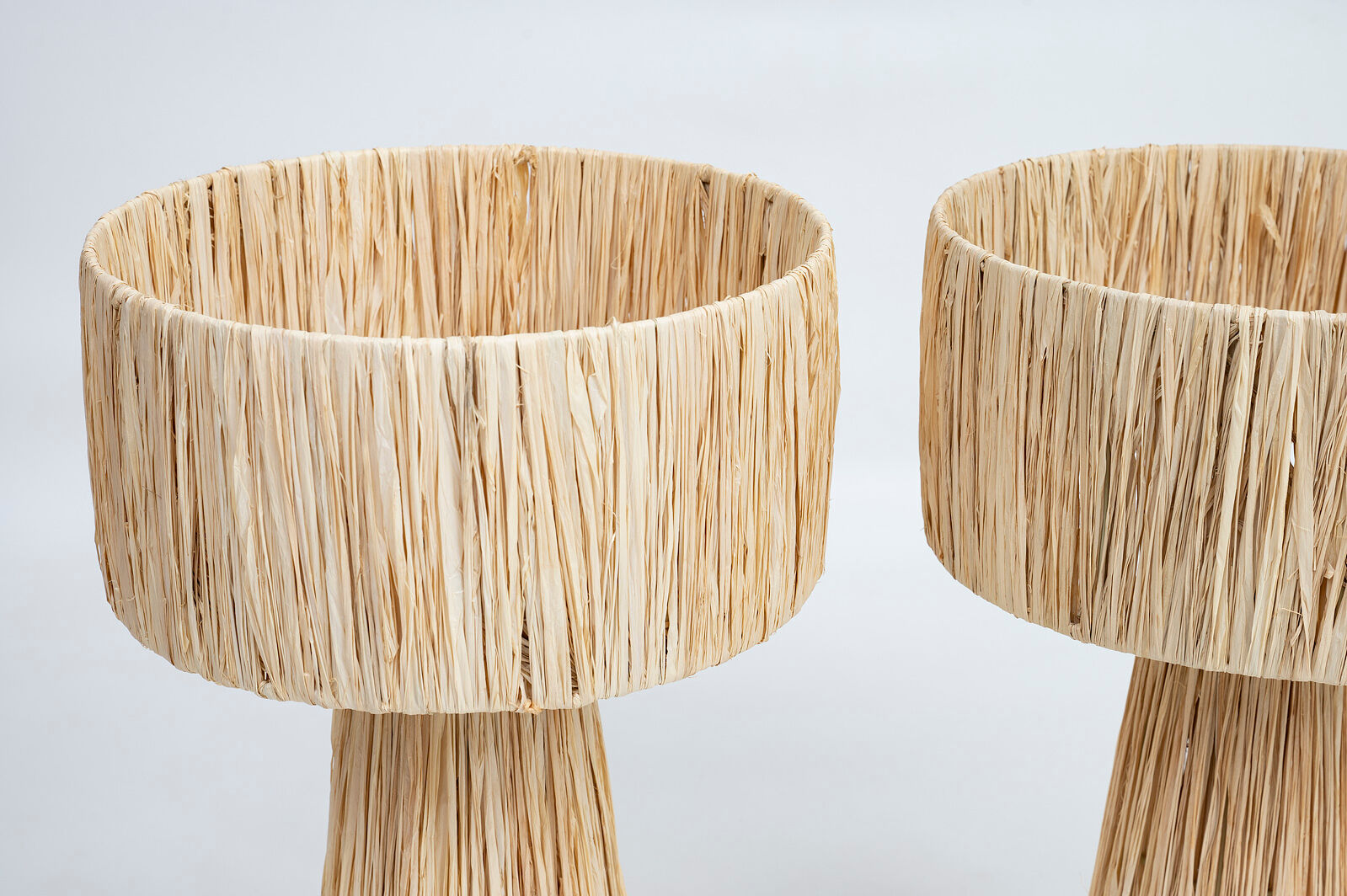 Handmade pair of natural rafia table lamps