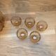 Carafe and 5 pink glass liqueur glasses with a gold rim 2008123