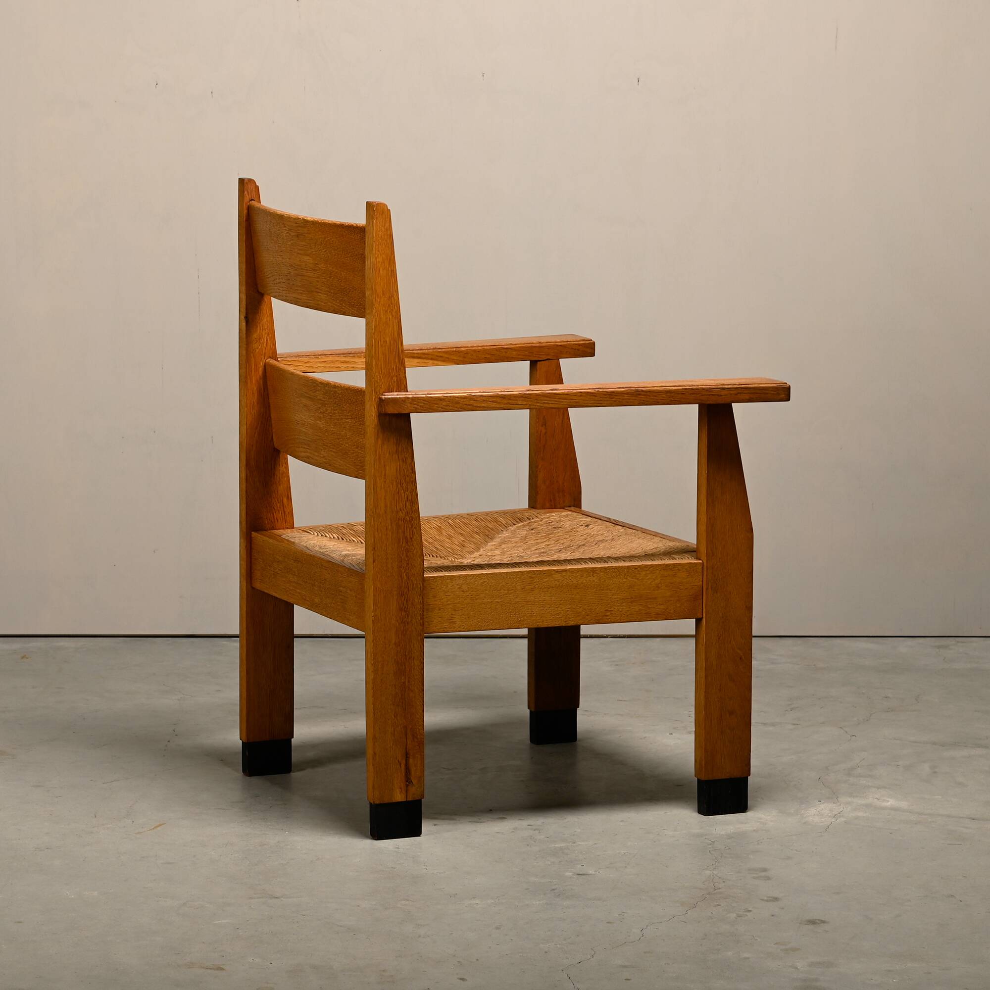 Art Deco Haagse School Armchair in solid Oak and Straw, 1930s