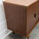 1960s teak sideboard with 4 drawers, 2 doors, and a mirror.