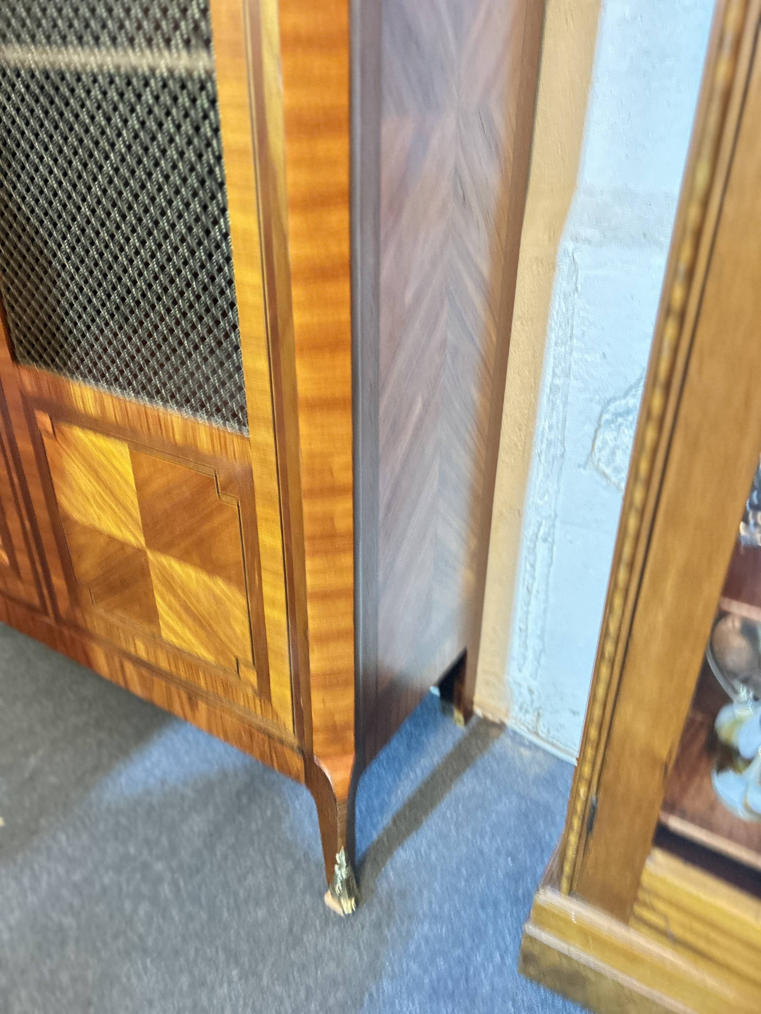 Directoire style display cabinet with two doors