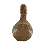 Wicker-sheathed glass bottle