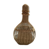 Wicker-sheathed glass bottle