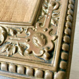 Antique brass metal picture frame in baroque style