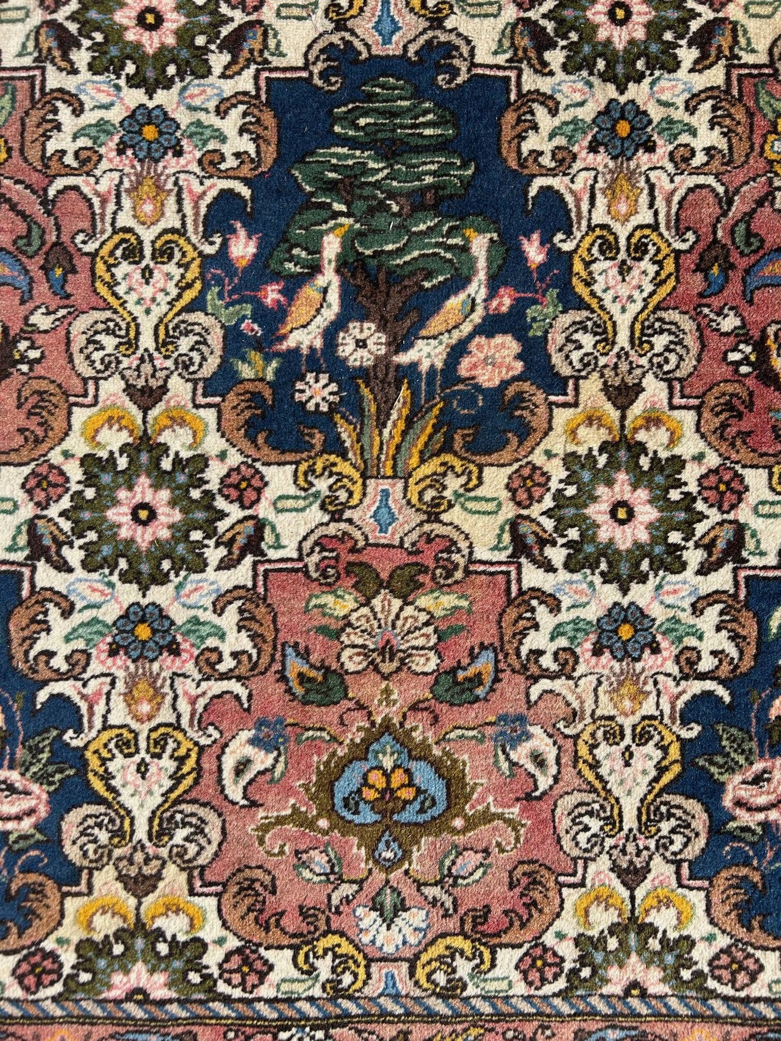 tapis d'orient à décor d'oiseaux 150/205cm