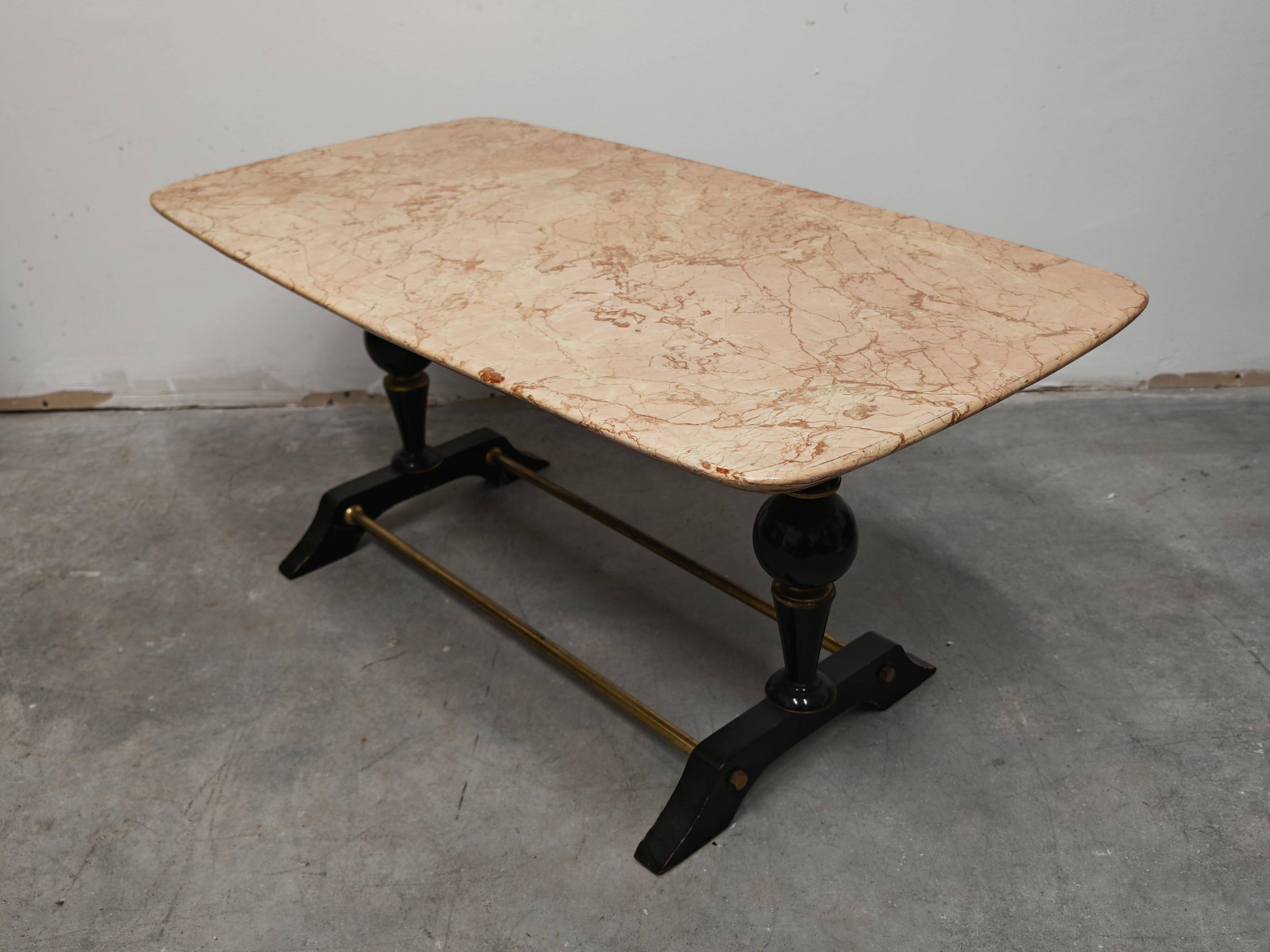 Mid-century modern coffee table in marble, brass, and wood, 1950s.