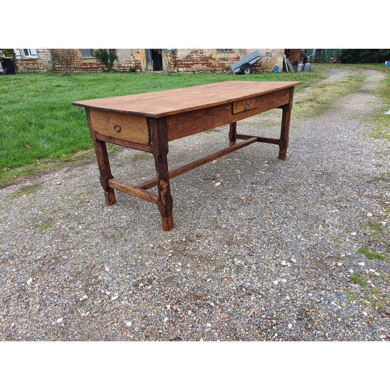 19th century country farmhouse table in walnut and pine, with 3 drawers