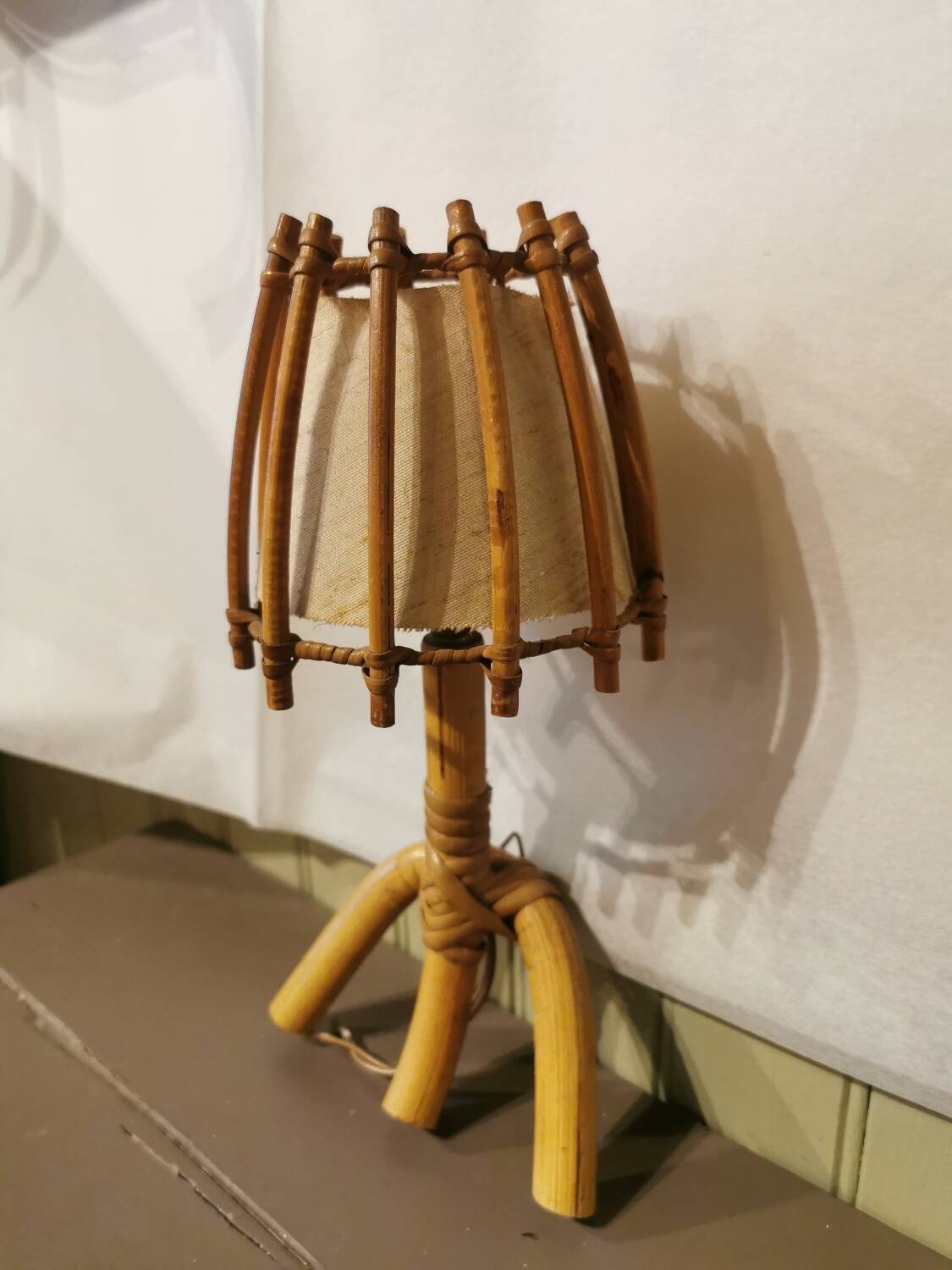 Vintage rattan wall light by Louis Sognot