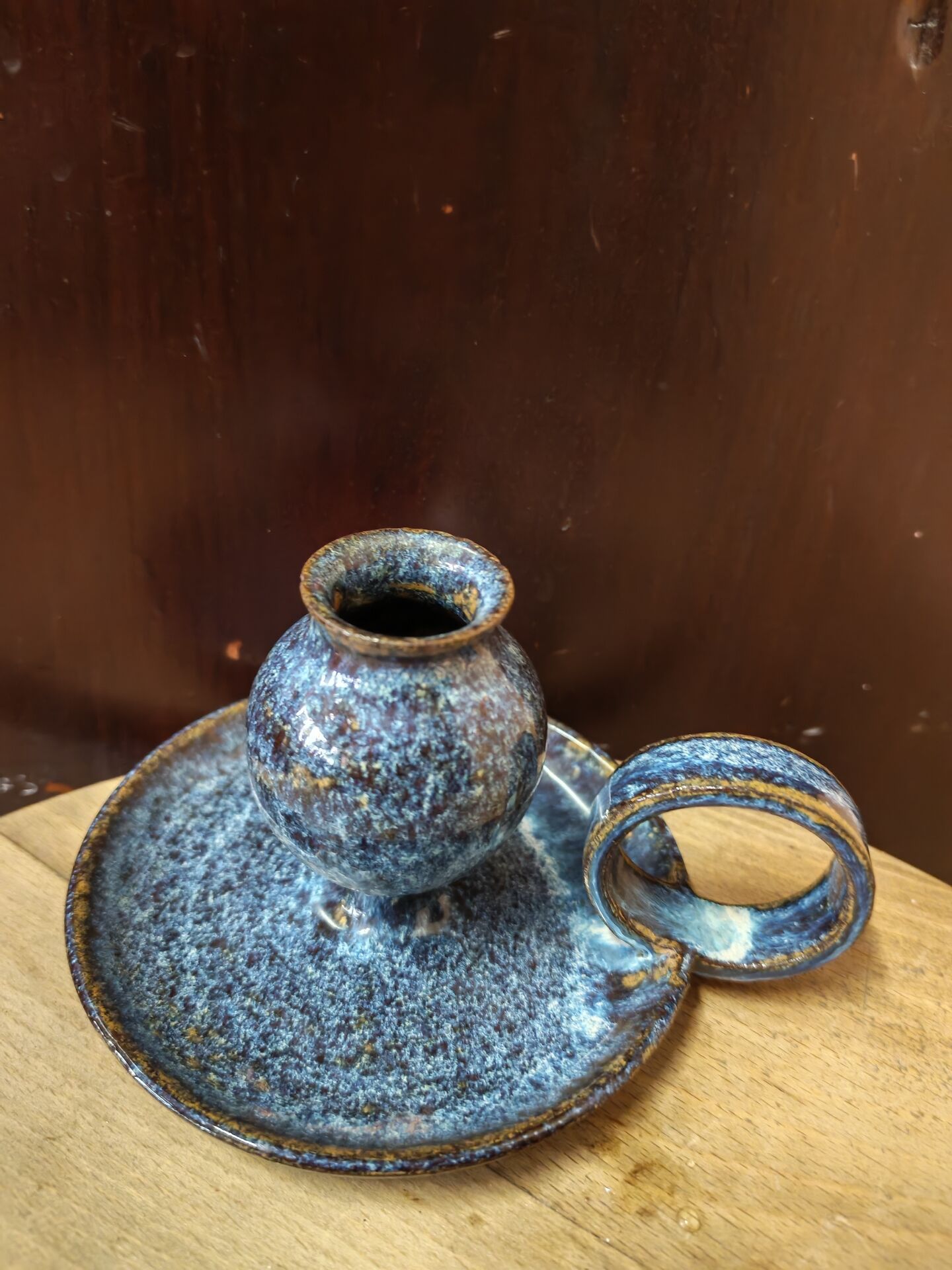 Pair of speckled glazed ceramic candle holders rat of the cellar