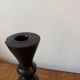 Pair of black turned wood candlesticks