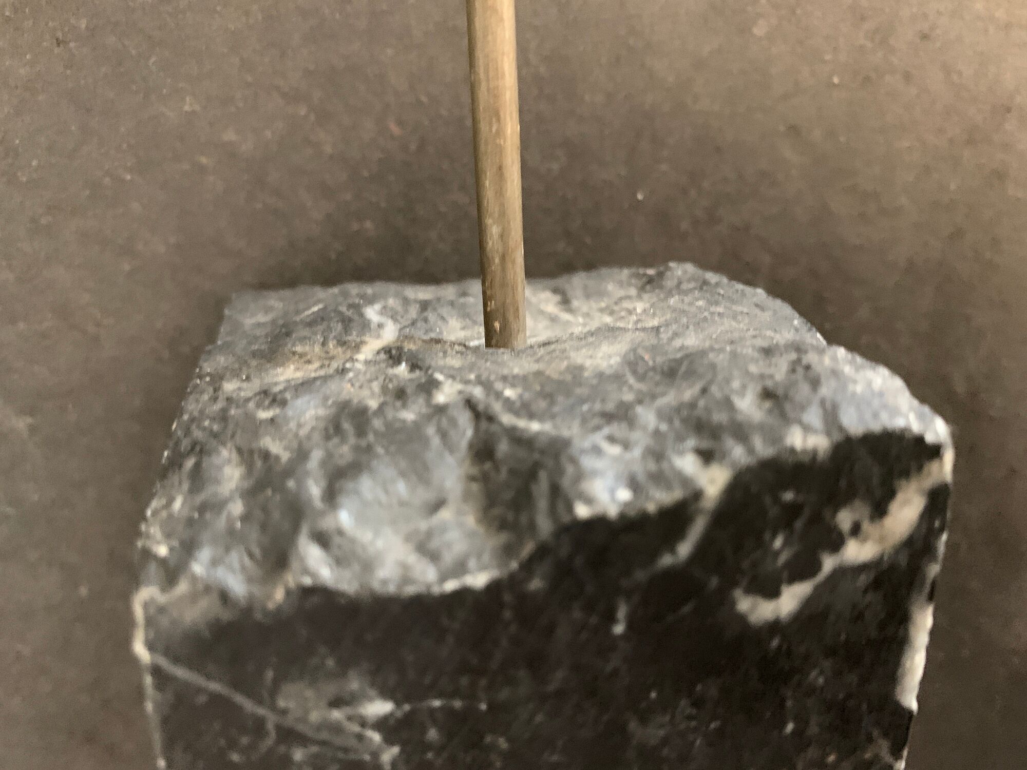 Swedish design candle holder in granite, metal and brass, 1980, height 39 cm