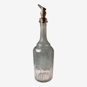 Old decanter nineteenth "Fine-Champagne" in blown glass