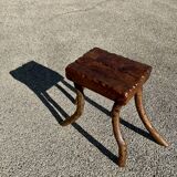 Solid wood stool in brutalist style