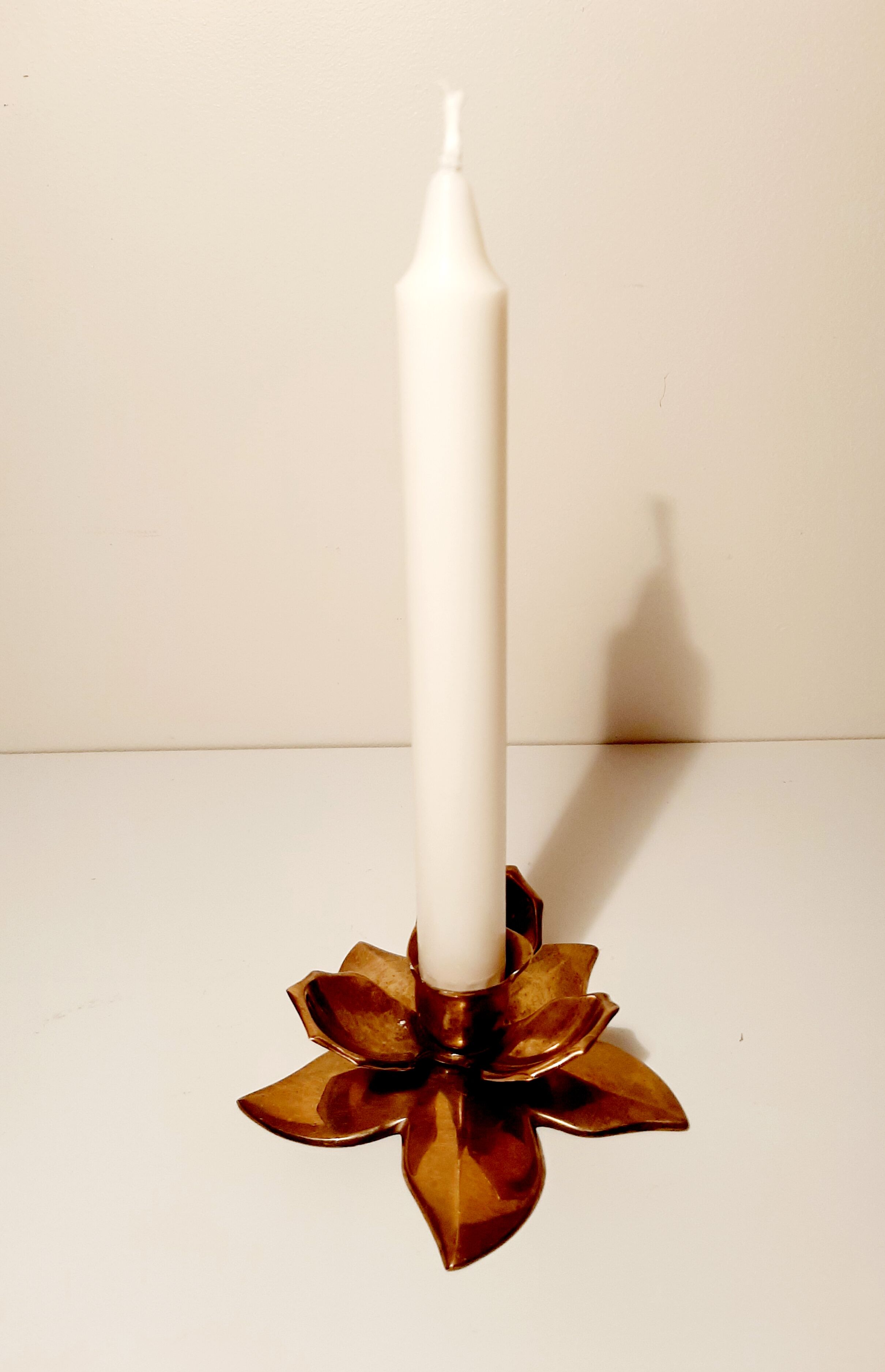 Golden brass flower candle holder