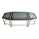 Rare three-part nickel coffee table with lacquered glass tops around the perimeter