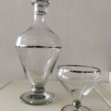 Carafe and its crystal glass.