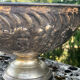 Large silver plated champagne cooler bowl on pedestal with grape