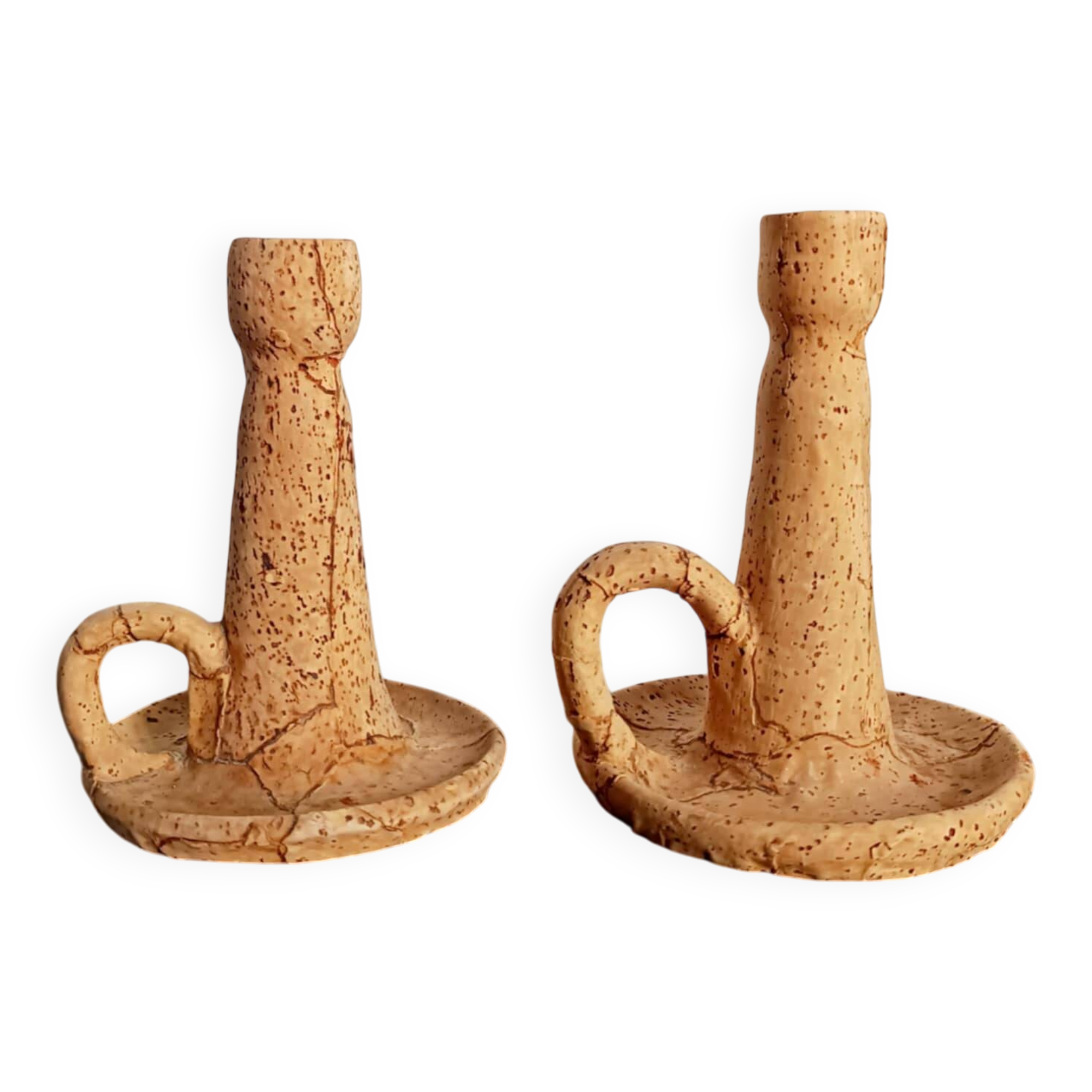 Pair of cork and terracotta candlesticks.