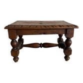 Tabouret bas en bois sculpté