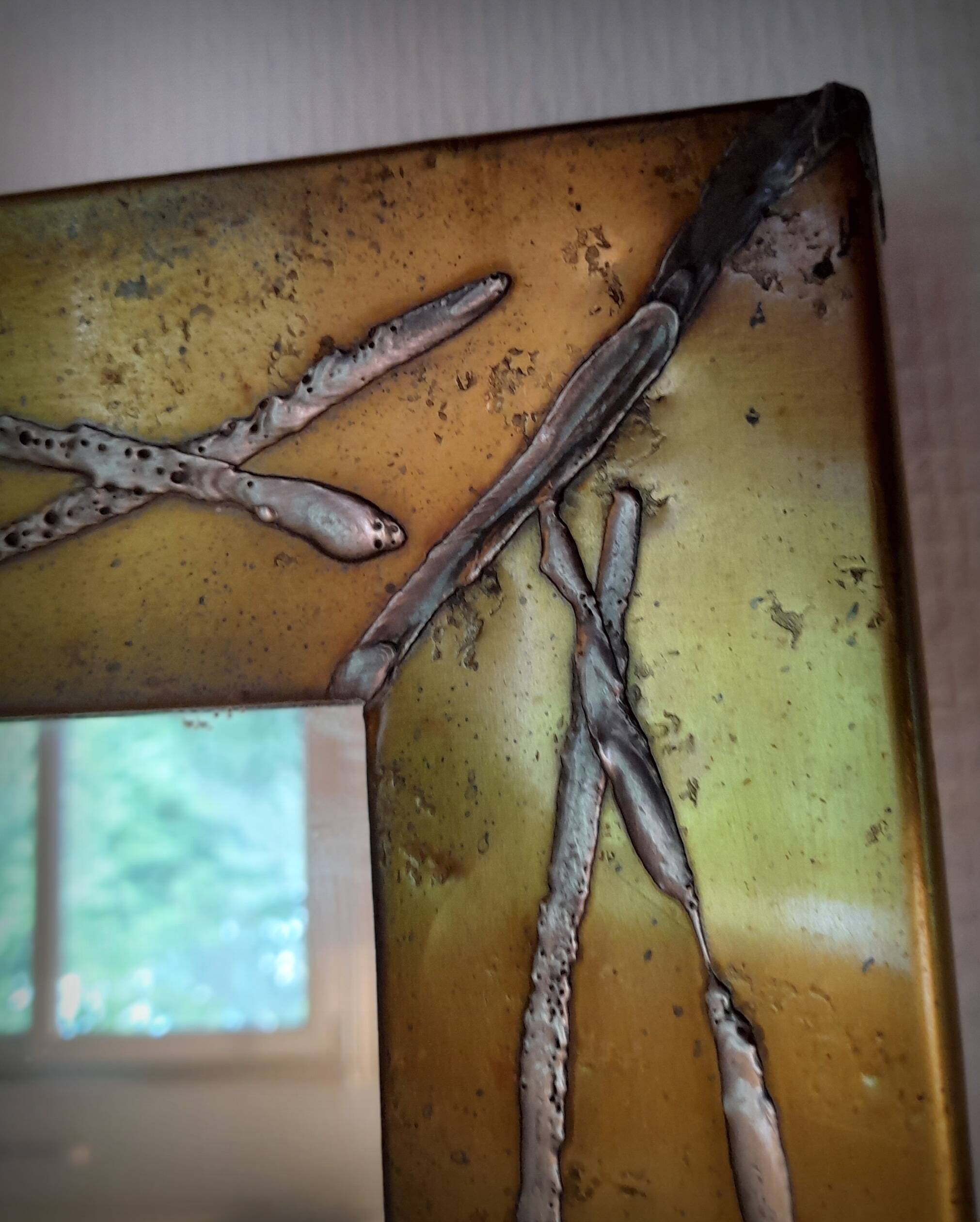 Brutalist brass mirror by Jean Goardere, France, 1970s