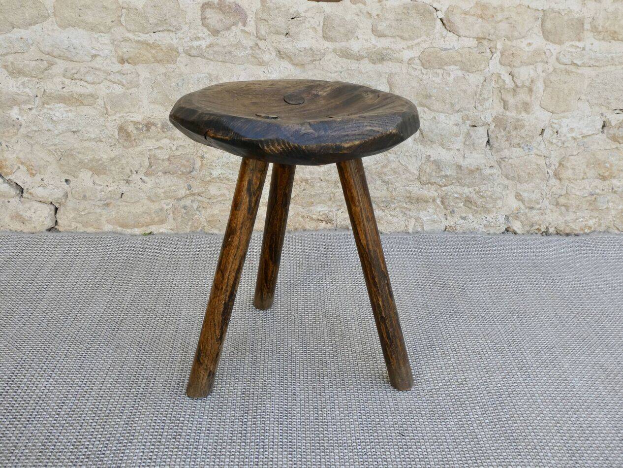 Tripod stool made of carved solid wood, handcrafted, around 1950.