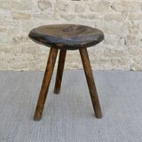 Tripod stool made of carved solid wood, handcrafted, around 1950.