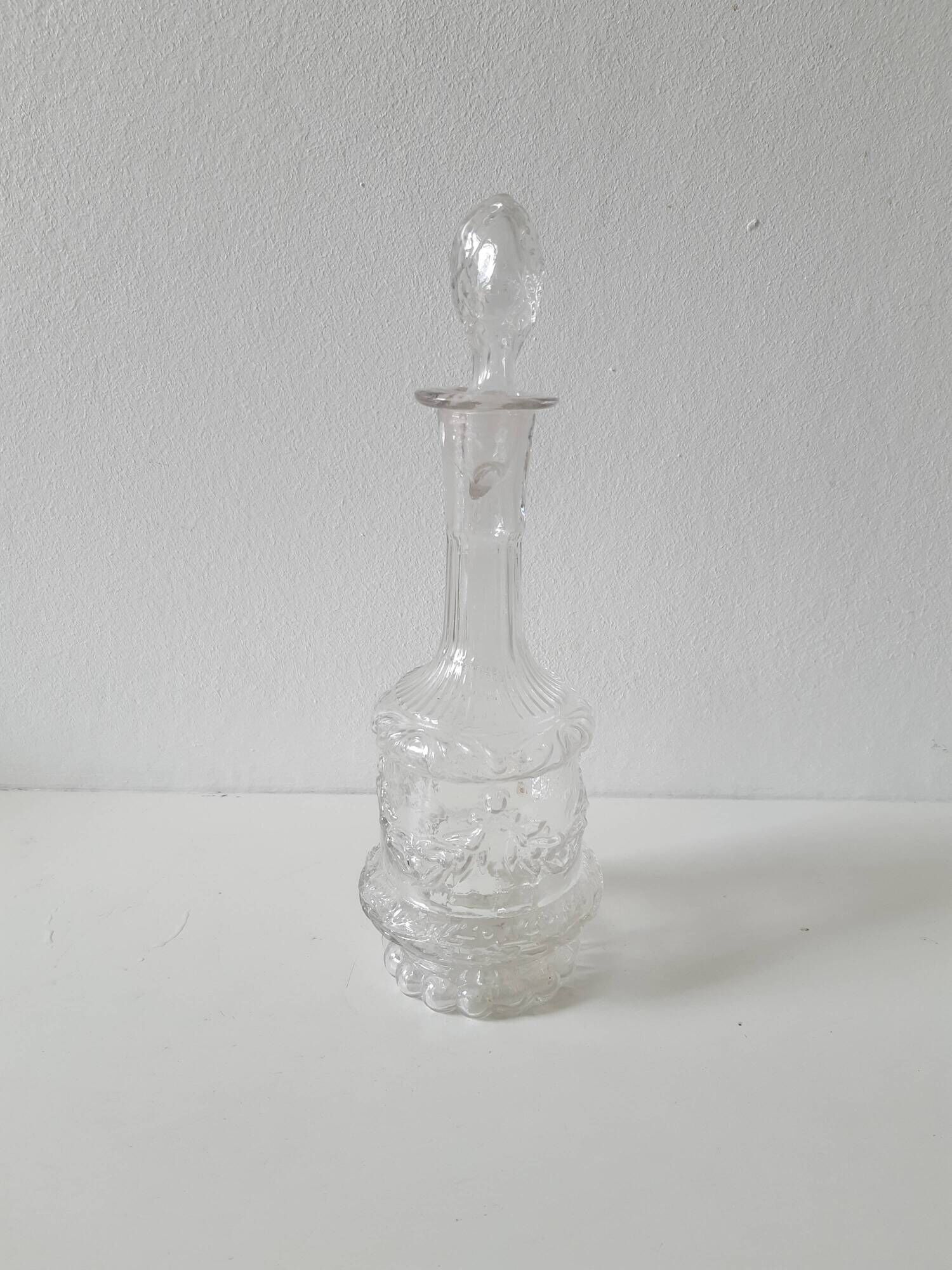 Set of 2 vintage carved glass bottles