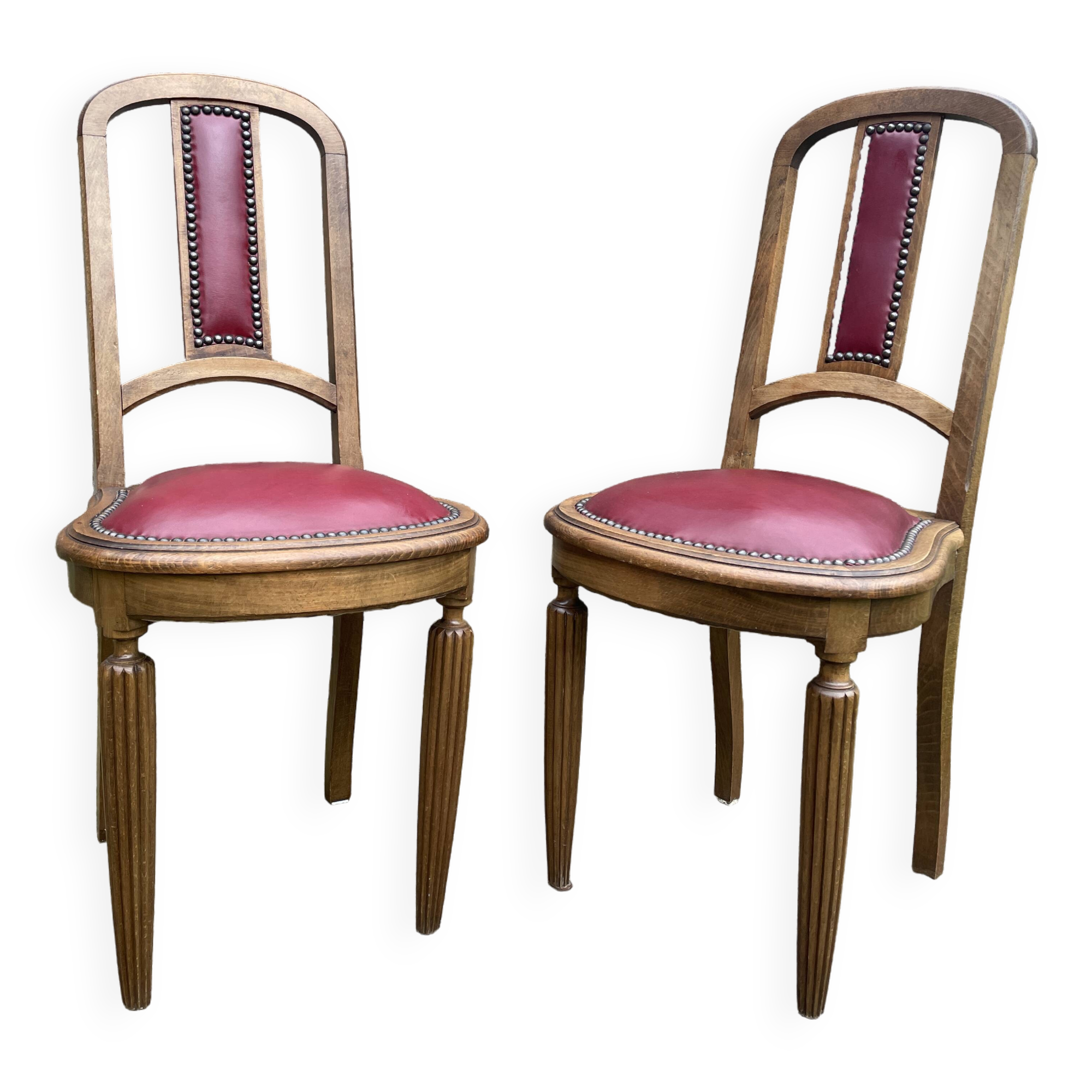 Pair of studded burgundy leather Art Deco chairs