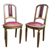 Pair of studded burgundy leather Art Deco chairs