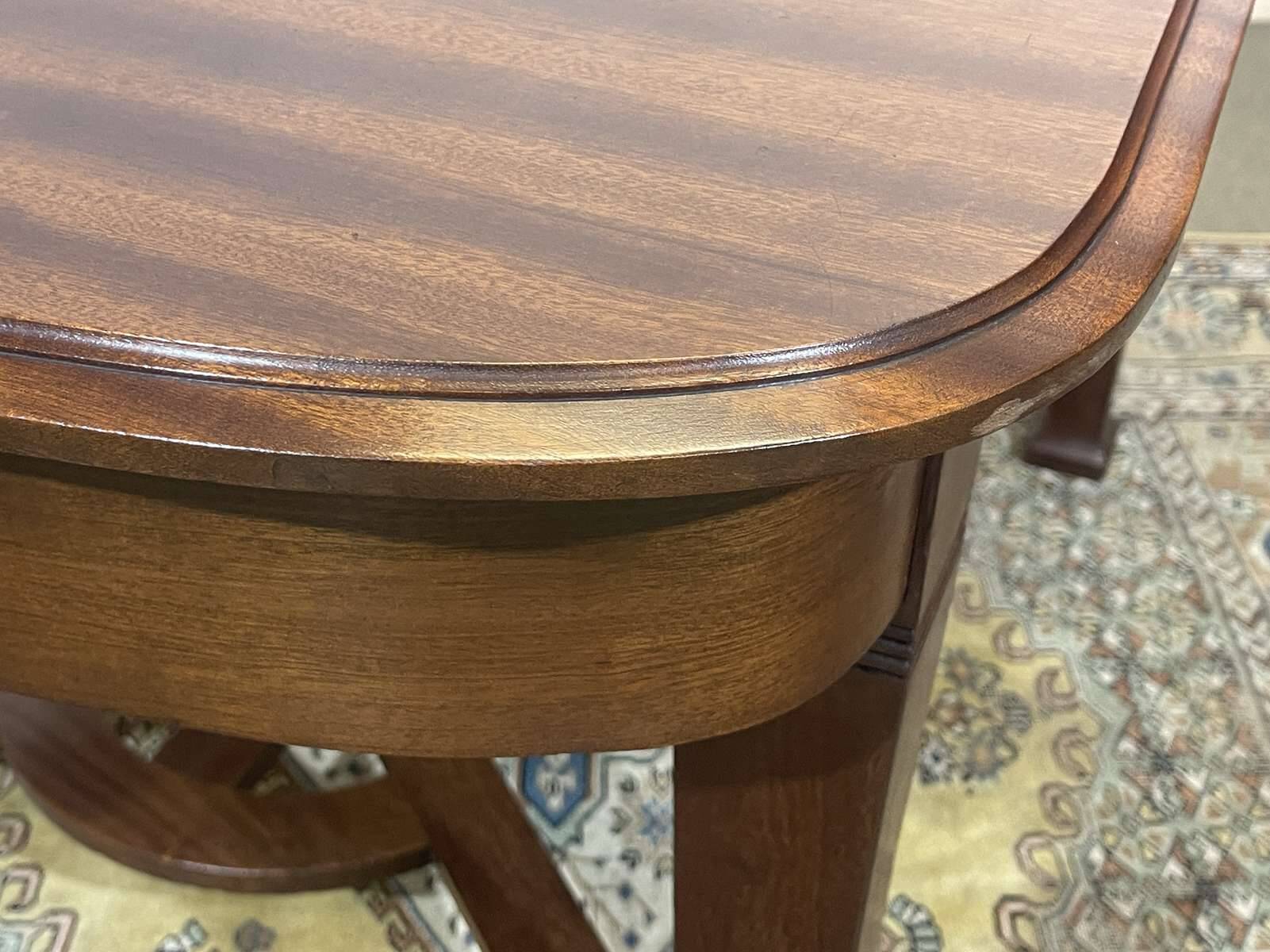 Art Nouveau dining table in mahogany in the style of Gustave Serrurier-Bovy.