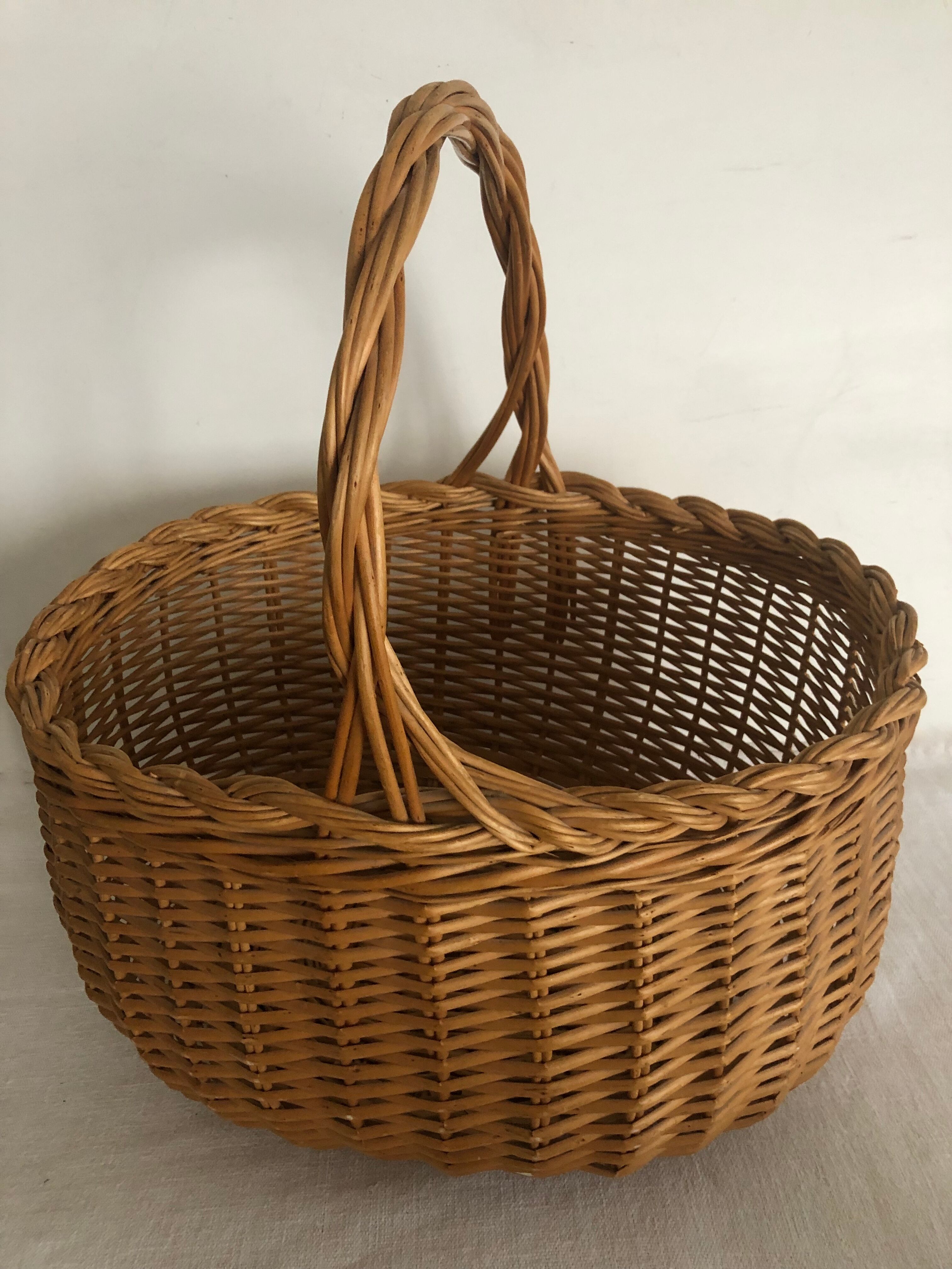 Braided wicker oval basket