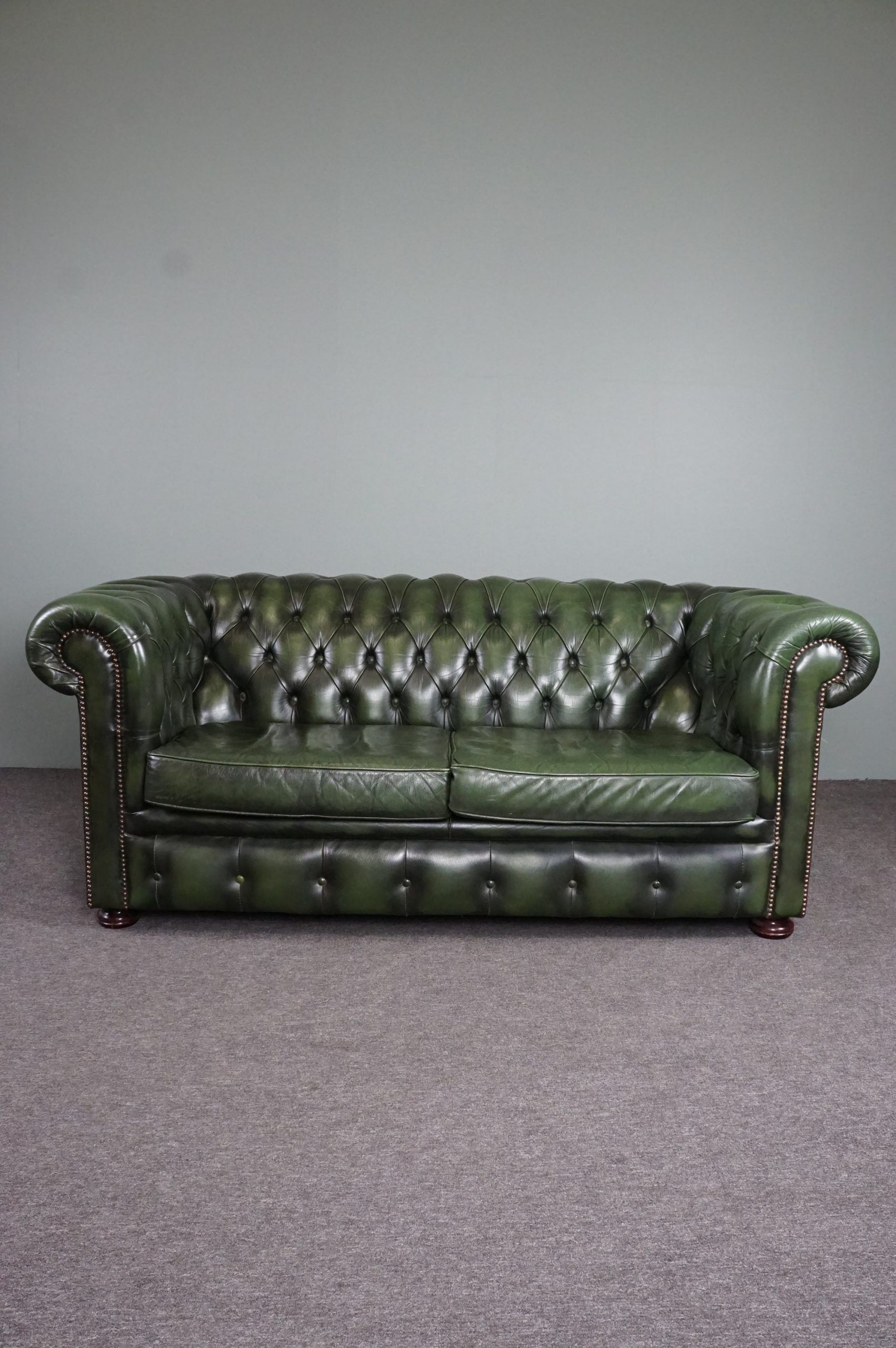 Chesterfield sofa in green cowhide leather