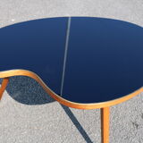 Bean coffee table with black glass top