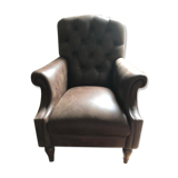 Armchair in brown leather