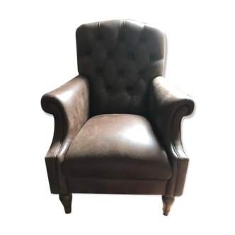 Armchair in brown leather