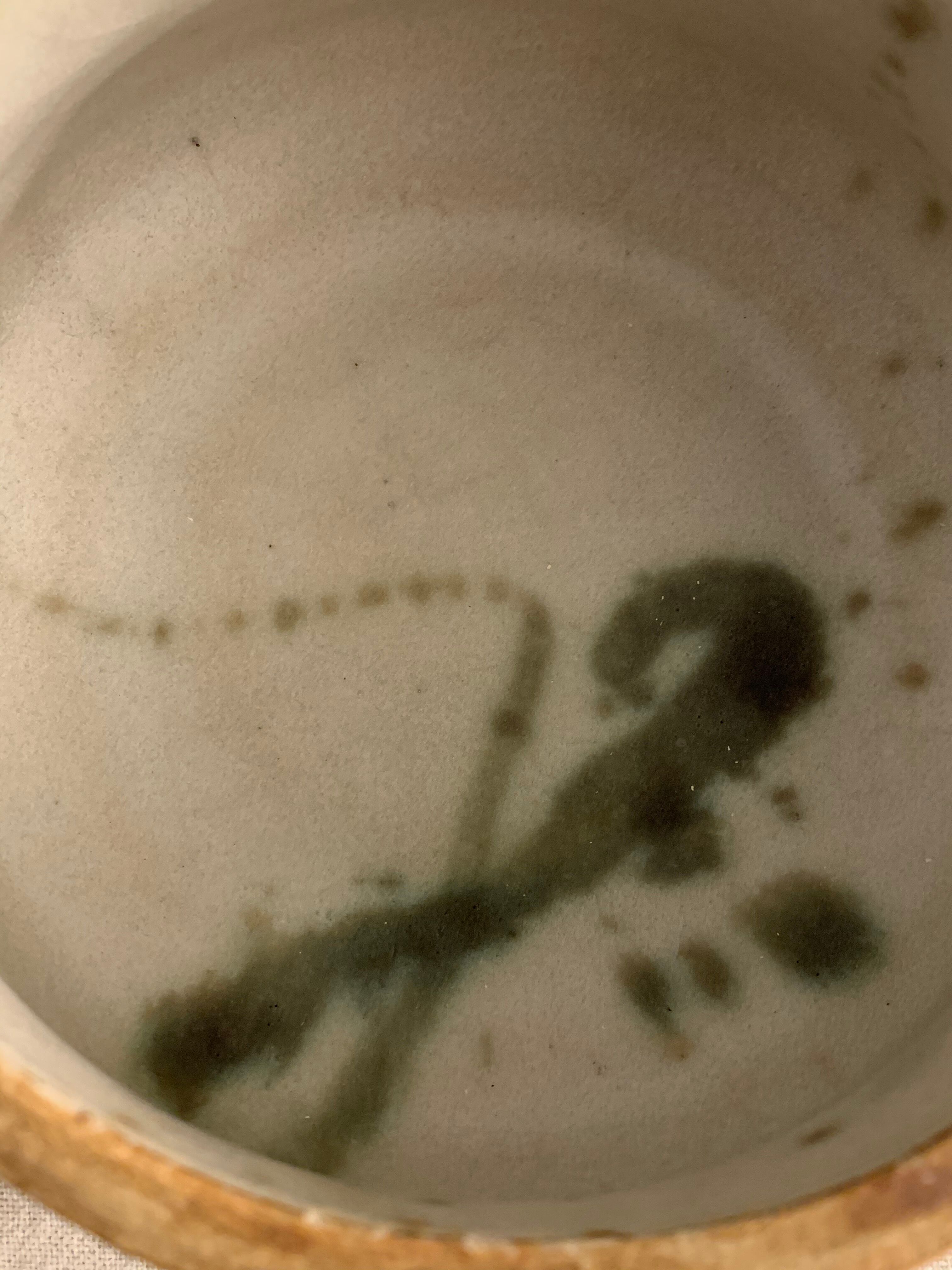 Ancient pot and its lid Pottery of the Dove in sandstone 1975