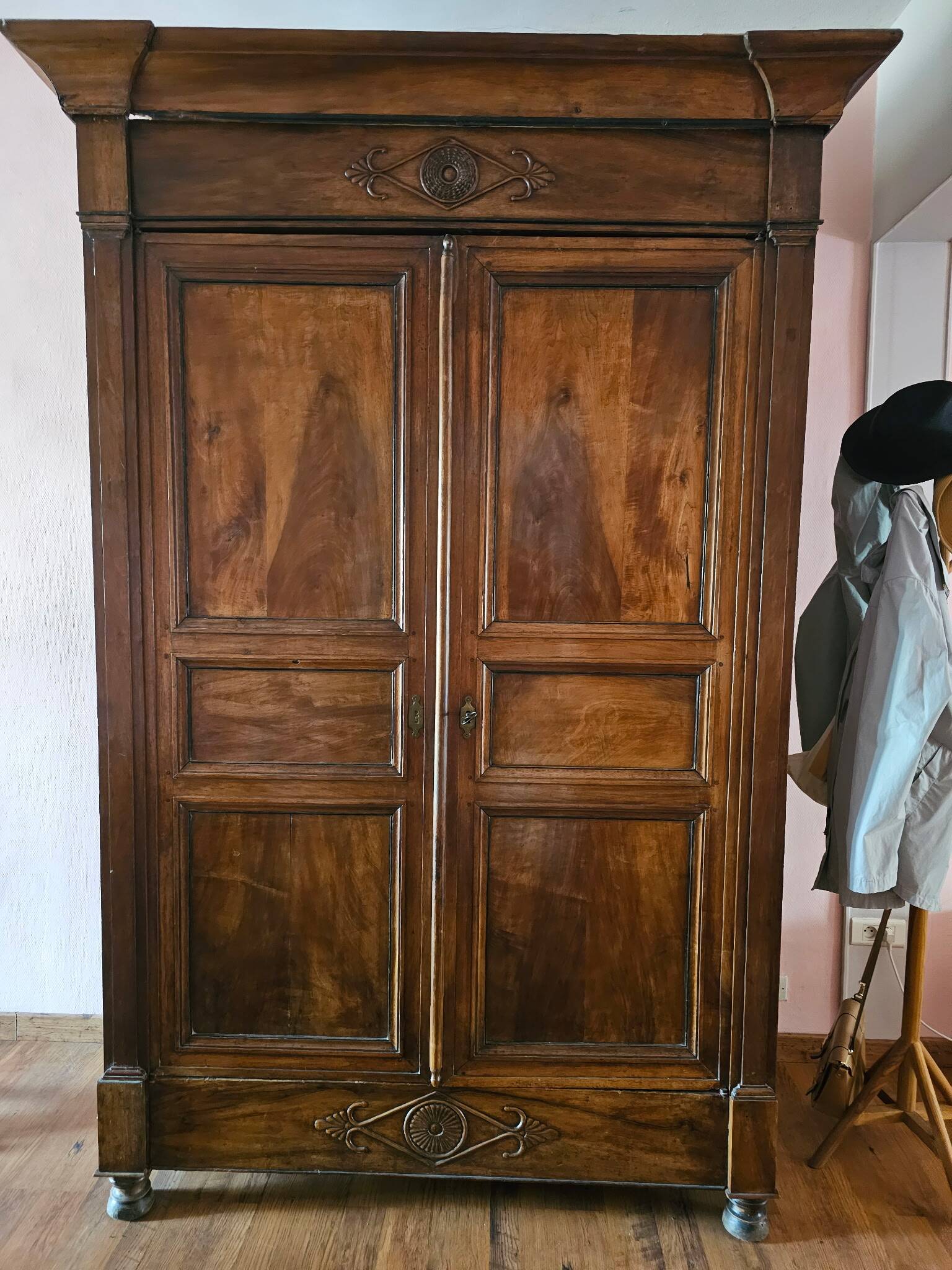 Directoire period wardrobe in solid walnut.