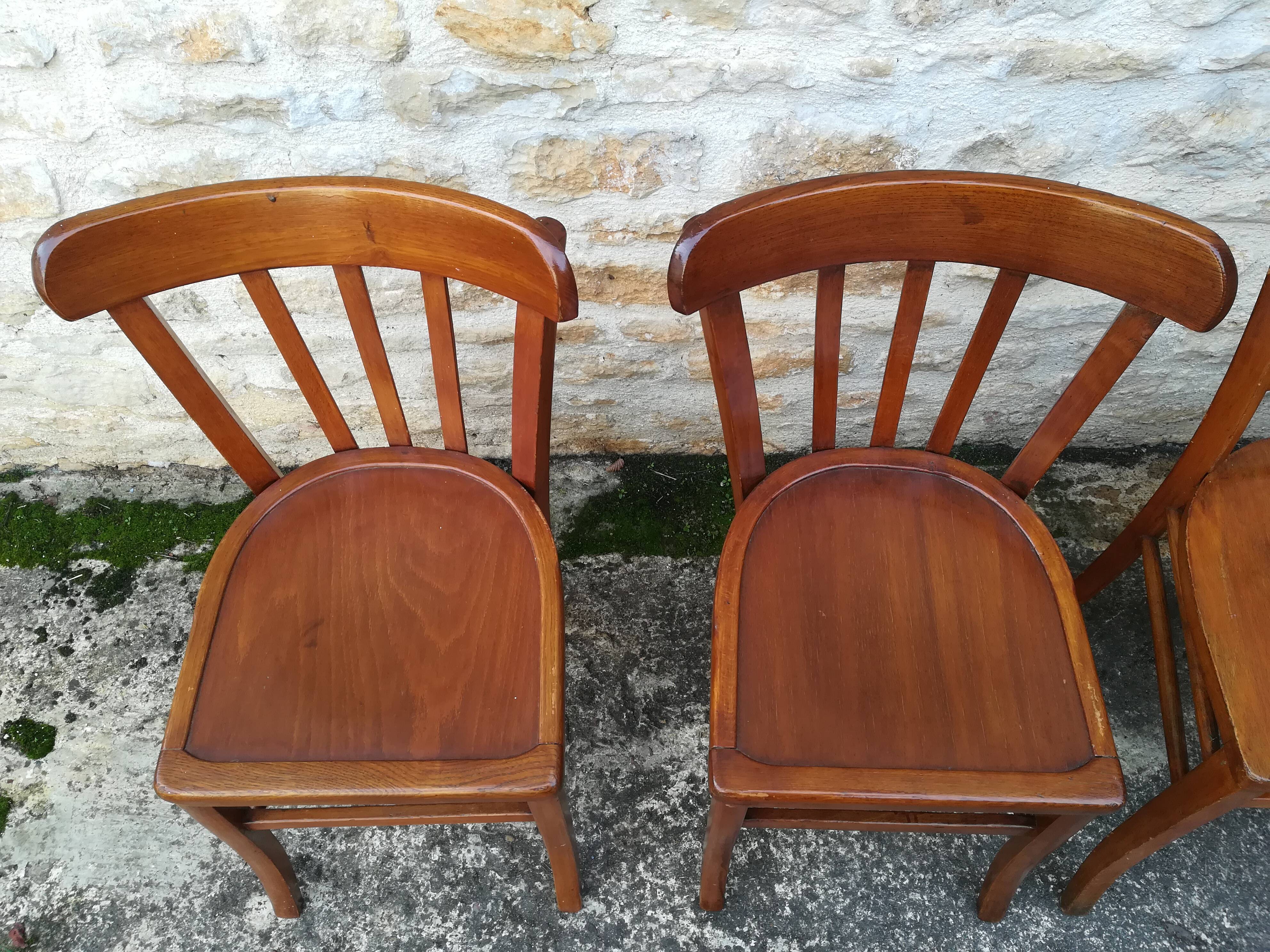 Set of 8 mismatched bistro chairs
