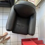 Matching black leather armchair – comfort and elegance