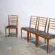 Series of 4 vintage chairs in wood and skaï