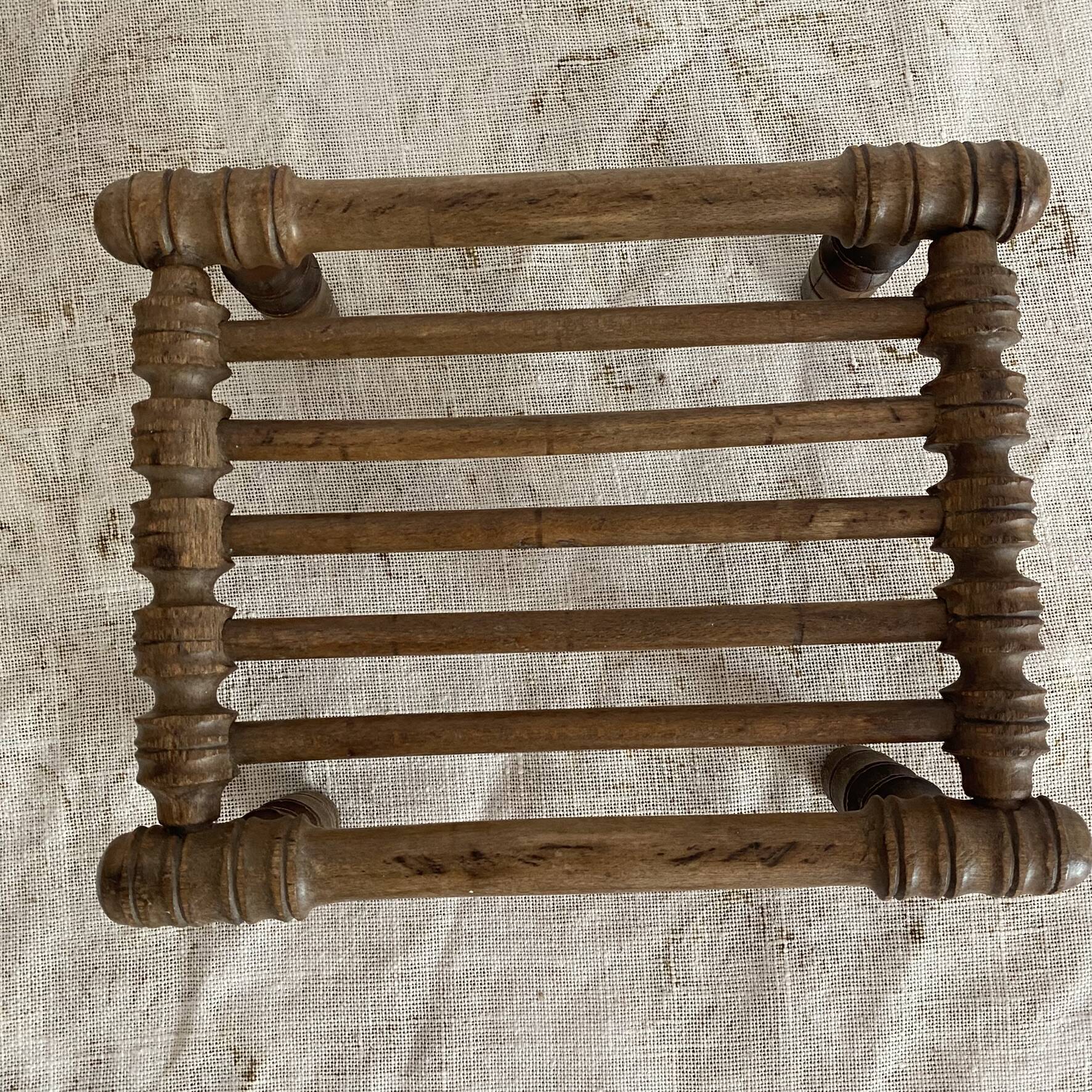 Old low turned wooden stool